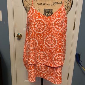 Orange and white top